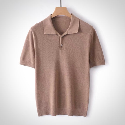Brown polo shirt on a hanger against a white background